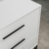 White three-drawer chest with black handles and steel base on tiled floor.