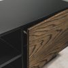 Close-up of modern black TV stand with natural wood door and open shelving, showing smooth finish and quality craftsmanship.